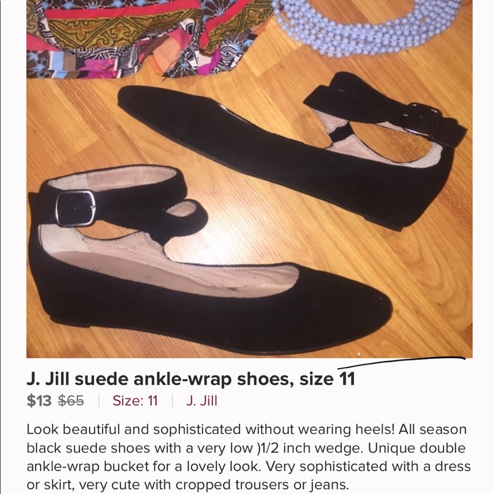 Black suede wedge ankle strap shoe, low heel.